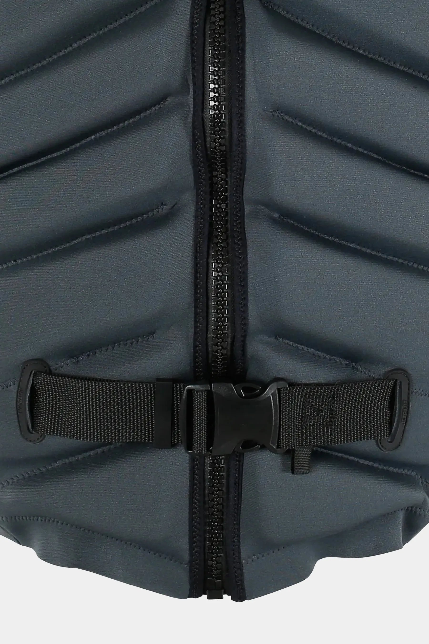Close-up of a Jetpilot X1 Life Jacket - Bust Dunn Signature Series - Charcoal with a black zipper and strap on a white background