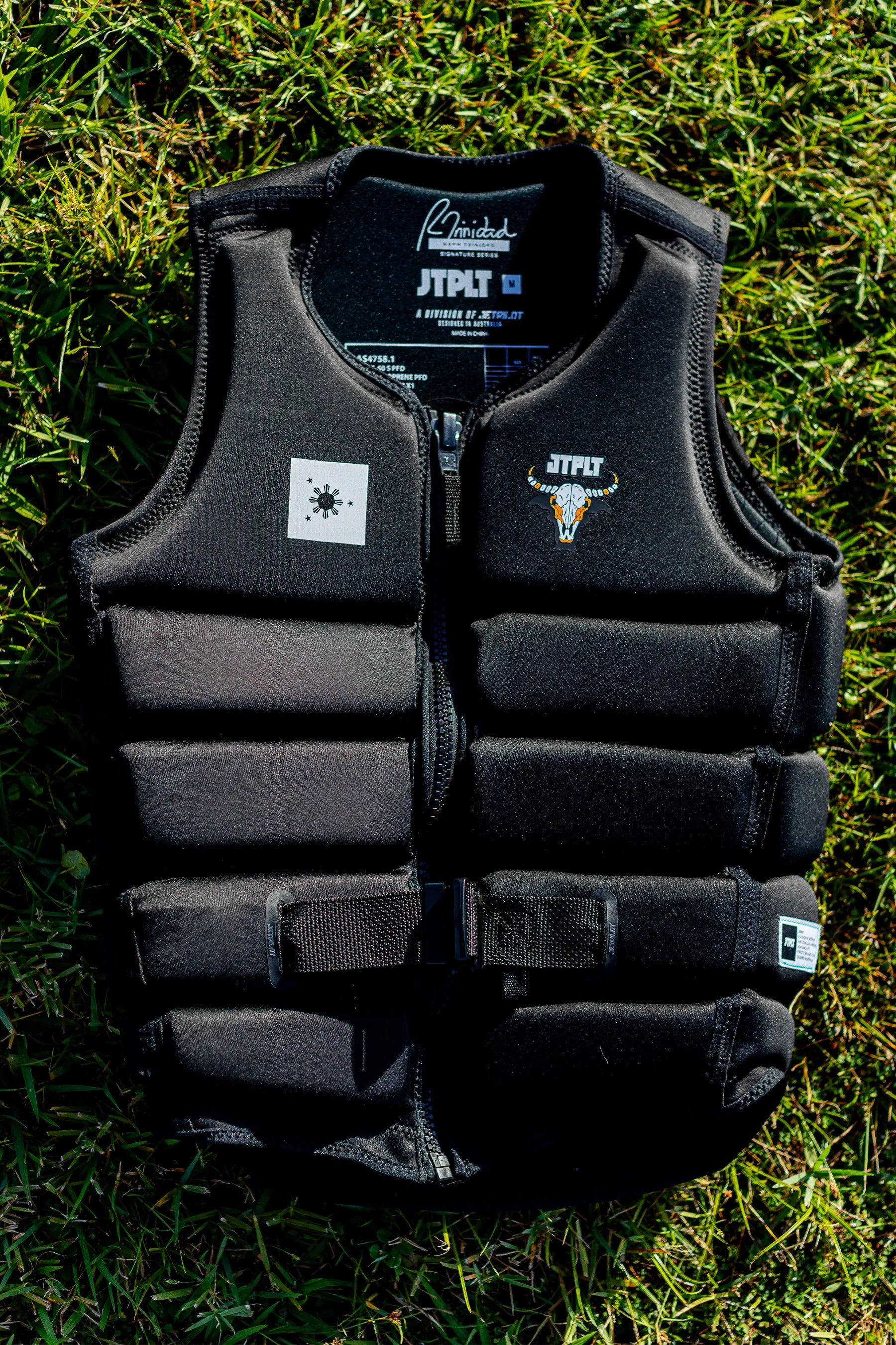 Jetpilot X1 Life Jacket - Raph Trinidad Signature Series  - Black on grass